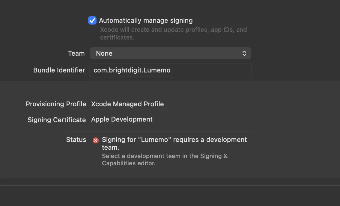 Xcode Signing tab showing 'Signing for Lumemo requires a development team' error
